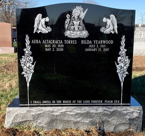Double Jet Black Headstone at Saint Charles Cemetery in Farmingdale, NY featuring custom sandblasting and etchings