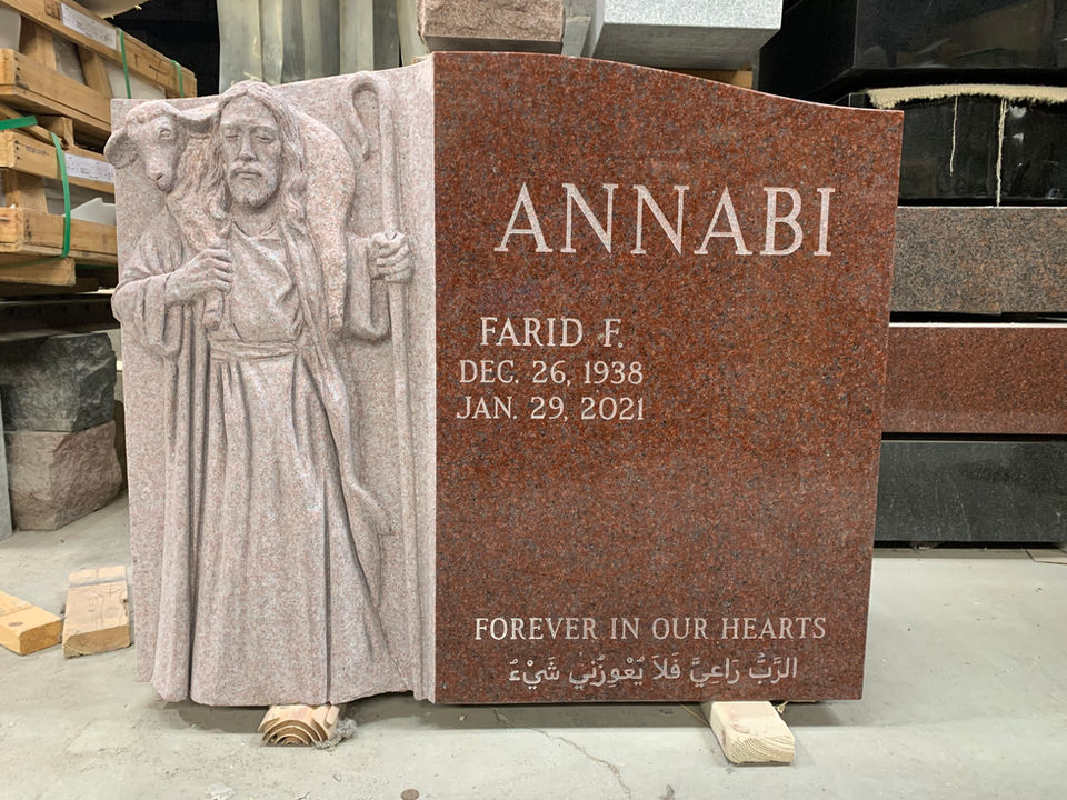 Stunning granite hand carving of Jesus with a lamb over his shoulders - India Red Granite