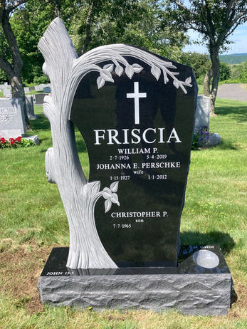 This Jet Black custom tree shaped memorial with a custom built vase on the base is installed at Mount Olivet Cemetery in Watertown, CT.