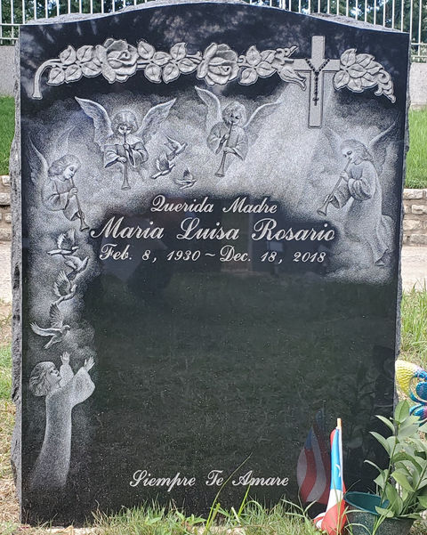 This Jet Black granite memorial features a custom Angel etching and is installed at Saint Raymond's Cemetery in the Bronx.