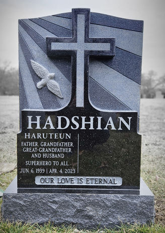 Custom Galaxy Black Memorial with a hand carving which is installed at Woodlawn Cemetery in the Bronx