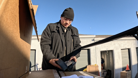 Alex Lee LoCicero-Campbell-Nieves, founder of Nieves Ministries, packing his truck to deliver donations Saturday.As the cold weather settles into Colorado, two friends are packing their pickup truck with hundreds of pounds of care kits and blankets to help those without a home. 