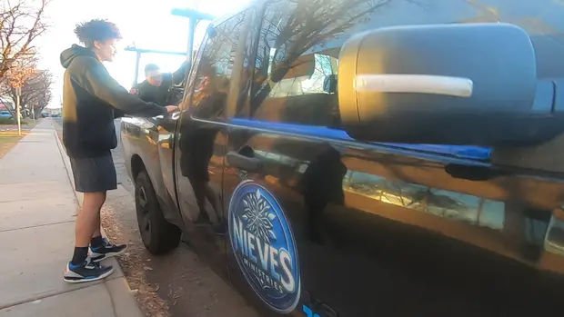 Eye-level view of a colorful Puerto Rican flag waving in the breeze