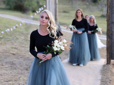 Saying their vows surrounded by trees and open skies...