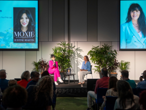 Justine Martin speaking on the stage