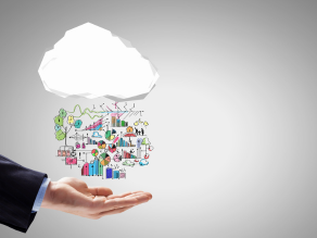 Close up of businessman hand holding cloud with business sketches.