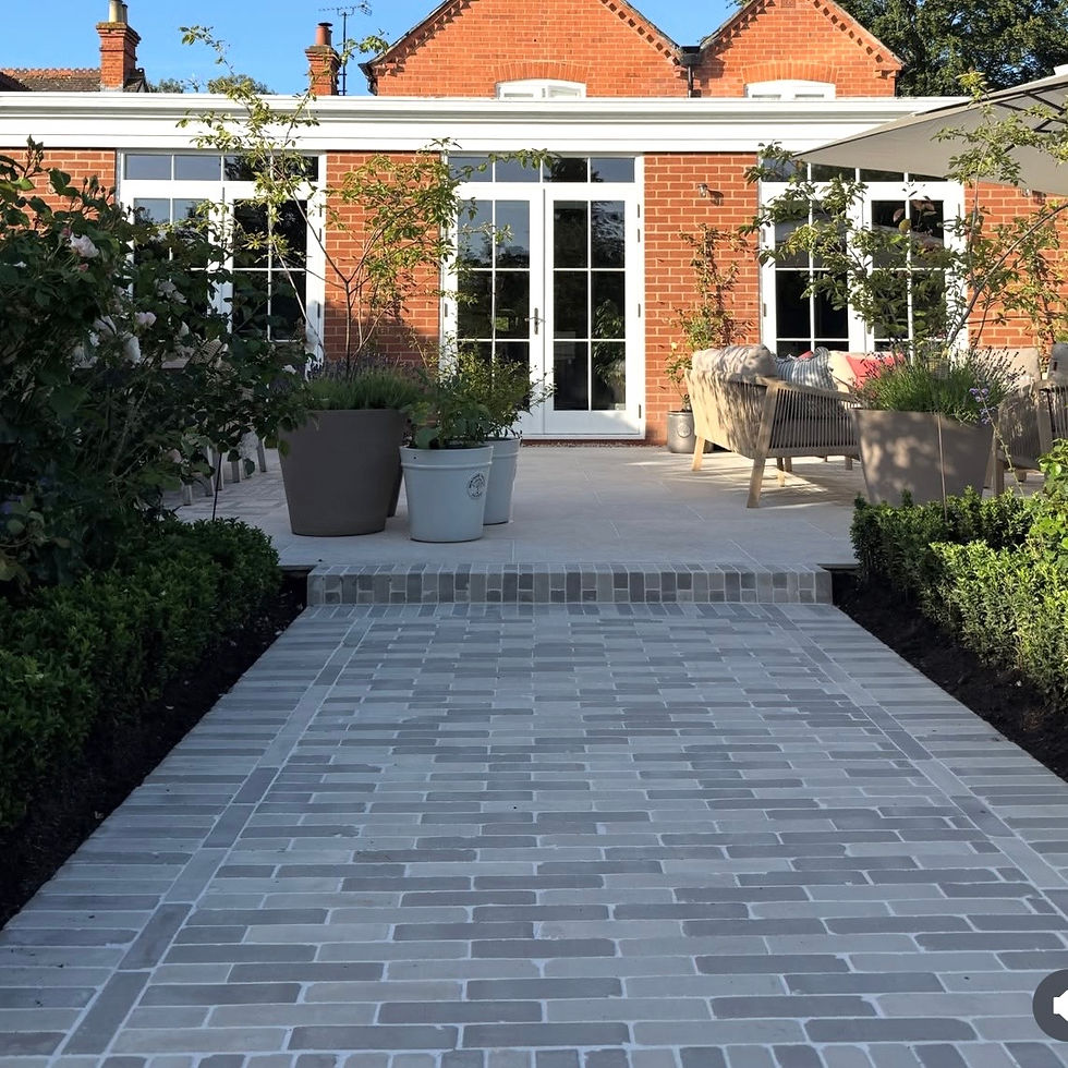 Cotswold inspired garden using a britstone burford porcelain tile.