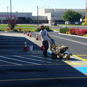 A Man Striping an Asphalt, Business, Parking Lot