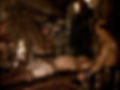 Dungeon view of the stoic muscled Knight being stretched on the medieval Rack