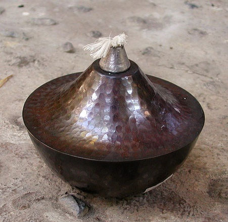 oil lamp in bronze or copper, classic style, handmade, bali, indonesia