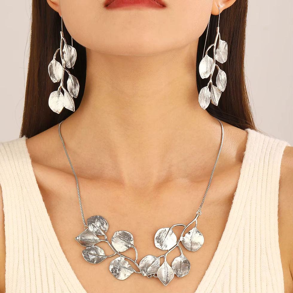 Thumbnail: Metal Leaf Tassel Necklace and Earrings