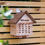 Thumbnail: Bee Hotel fitted to fence