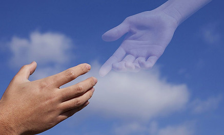 hand touching ghostly hand in sky - medi