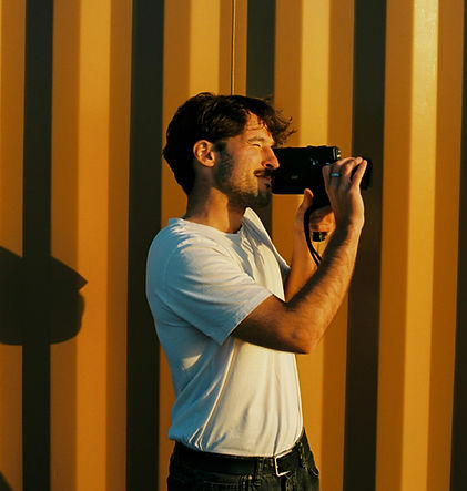 Nemanja filming on Super 8 by the coast