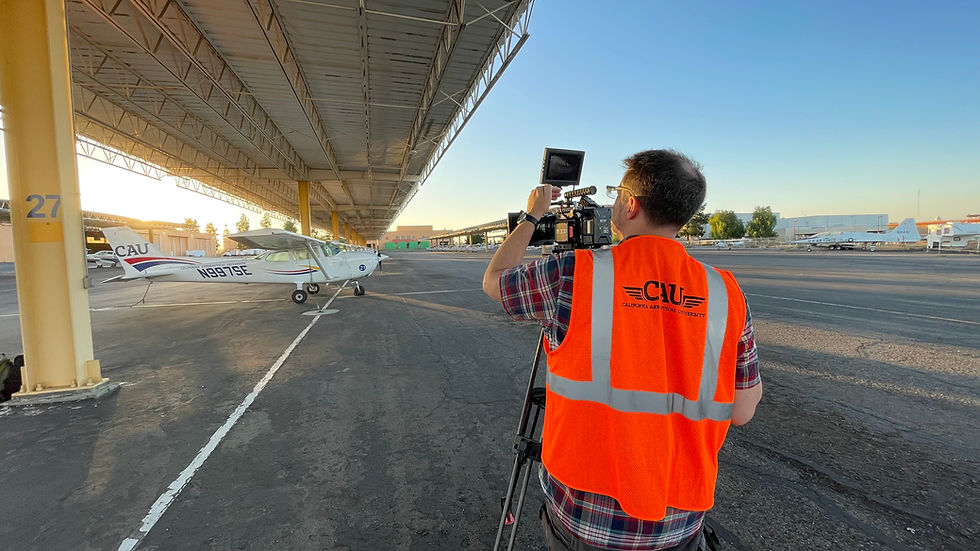 Cinematographer Adam White filming on the CAU Bakersfield flight line
