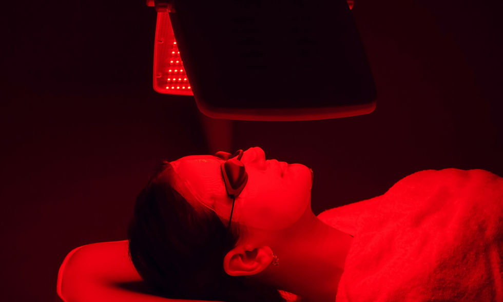 Female getting red light therapy panel for her face