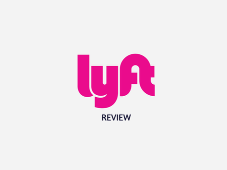 Lyft logo in bold pink text with "REVIEW" below on a white background. Purple banner with coins to cash dollars logo in the corner adds contrast.