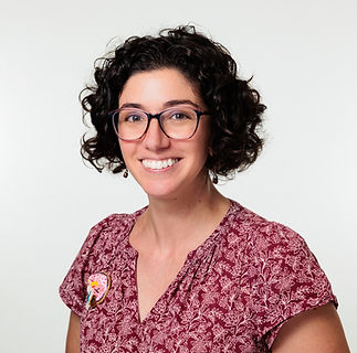 Headshot square looking left.jpg