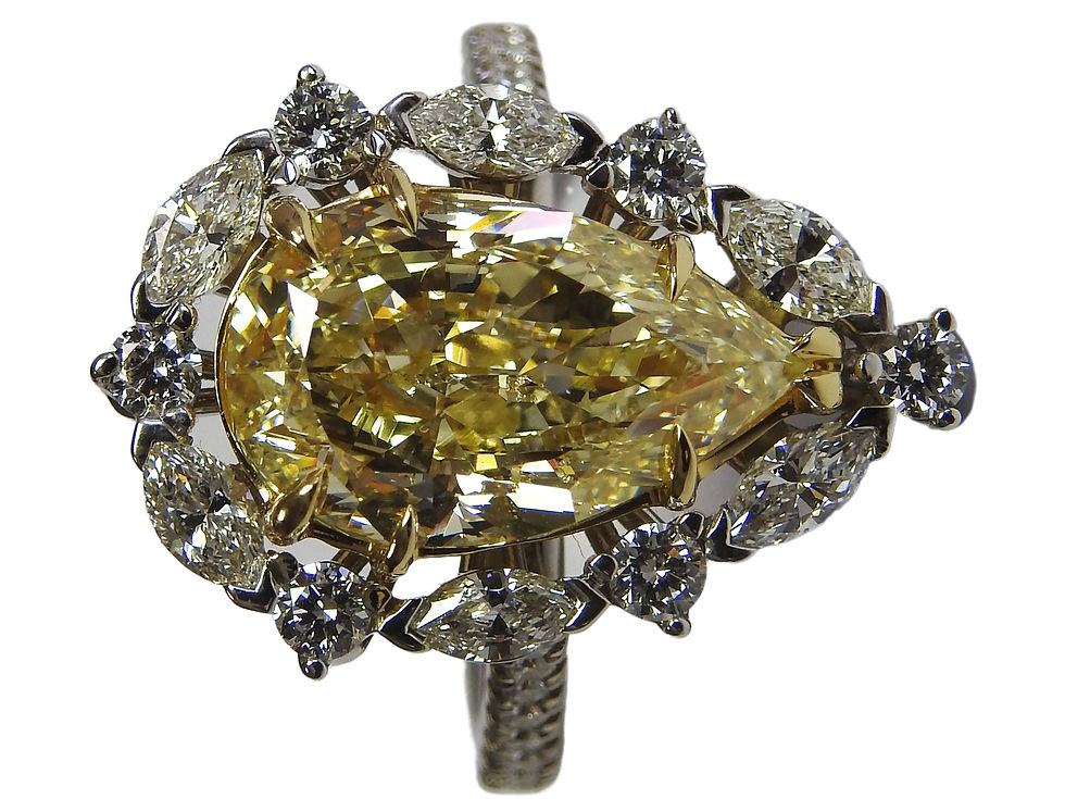 Thumbnail: 6.27 ct Yellow Fancy Diamond Pear shape with Marquise and Round Diamonds