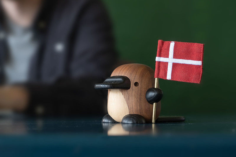 Perry the wooden platapus with a danish flag