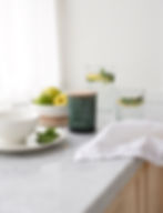 a Skandinavisk - ARKTIS - 200g Scented Candle on a windowsill