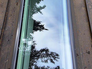 Husser technicians performing skylight detail and exceptional window cleaning services at a home in Shoreline, WA