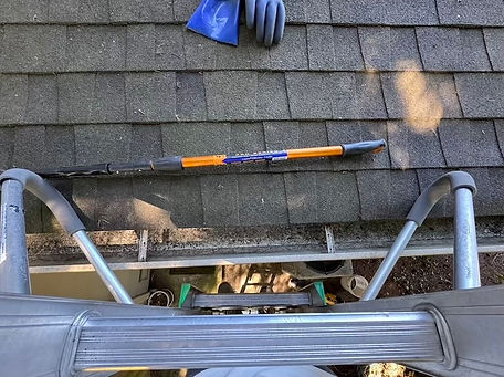 recently cleaned gutters after removing all pine needles, mud and compressed debris