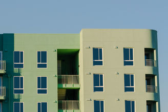 Architectural Photography, Bright Green Building against blue sky in san diego, california