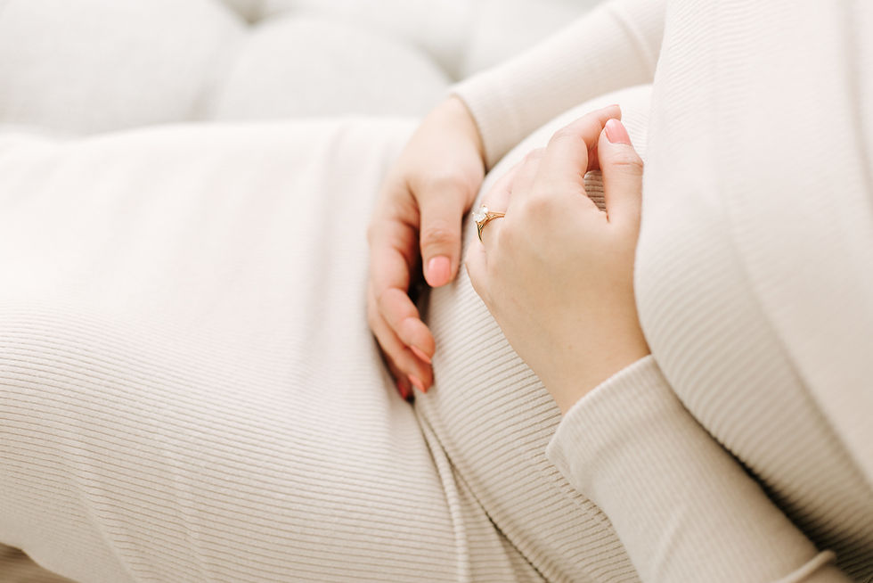 Pregnant woman during a maternity session in Guelph, Ontario