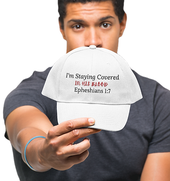 mockup-of-a-man-showing-off-his-dad-hat-in-a-studio-27046 (1)_edited.png