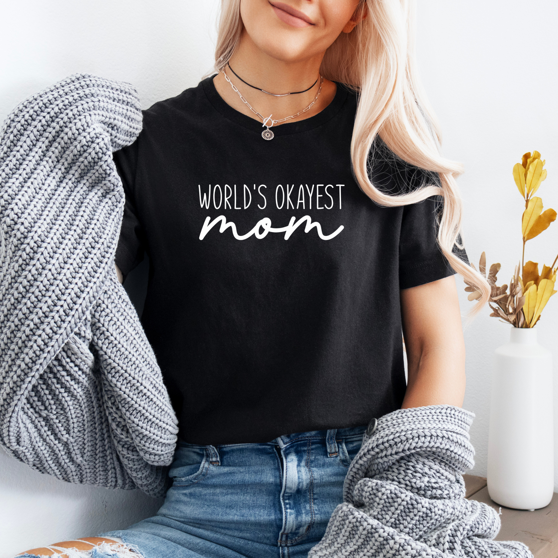 Black tee with the words World's Okayest Mom