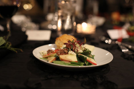 Portrait of a close up of a salad on a plate on a table