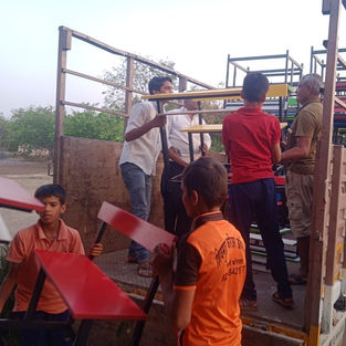 Delivery of new benches and tables.jpeg
