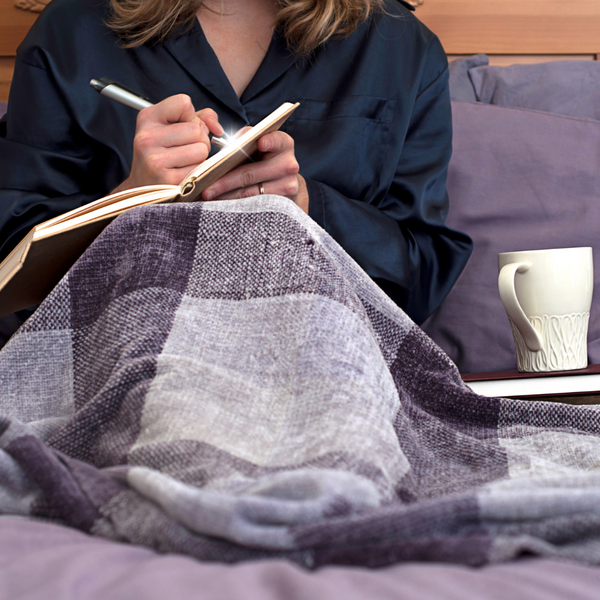 Midlife woman journaling
