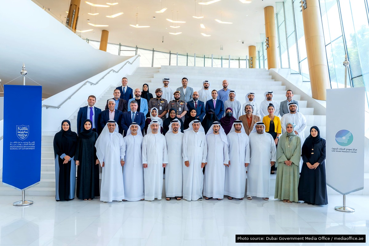 UAE Model Research Centre launch group with centre and Mohammed Bin Rashid School of Government signage