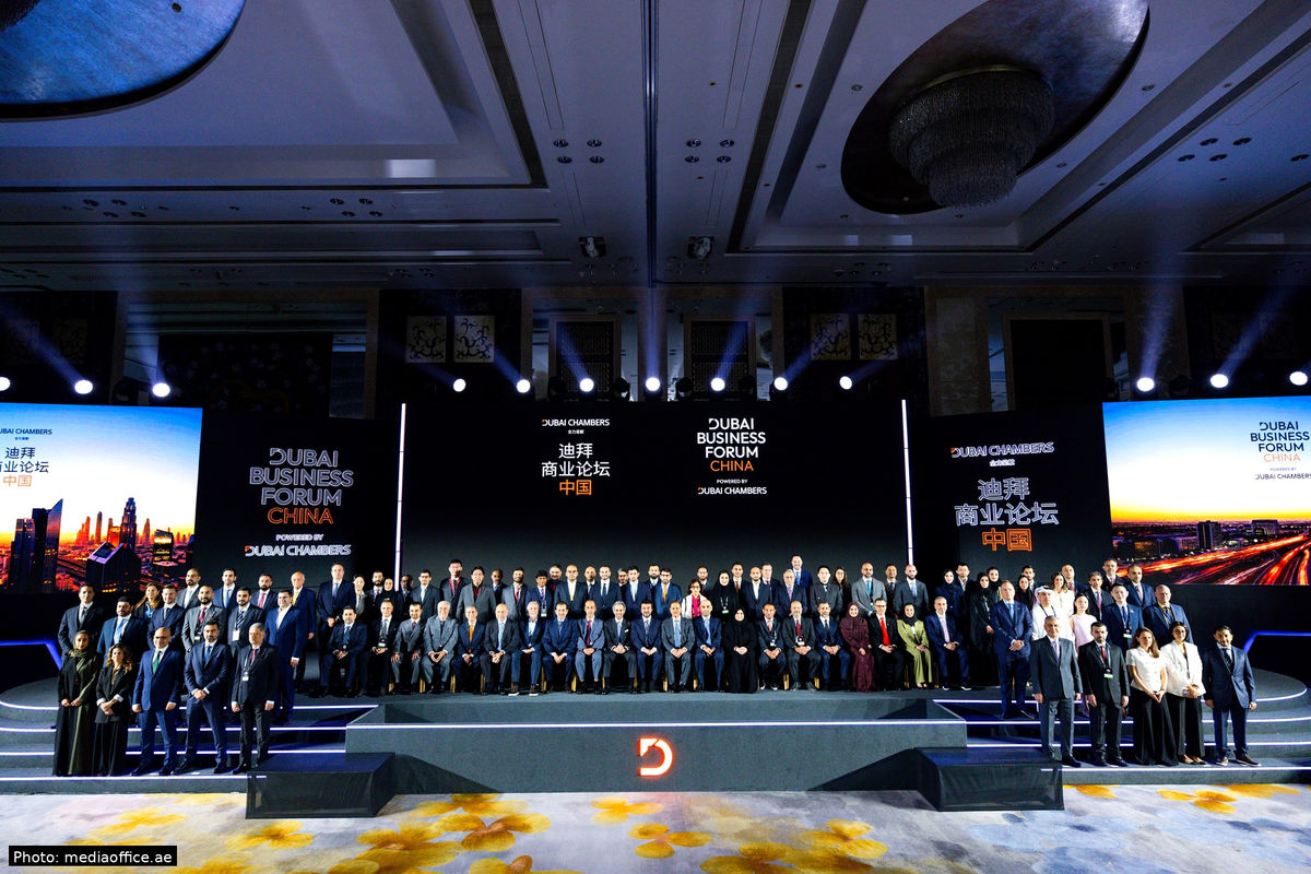 Dubai Business Forum China signage behind the Dubai Chambers delegation in Shenzhen, 14 October 2026