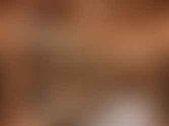 Large cedar infrared sauna with two-tier benches and LED lighting in a Burnaby high-rise.