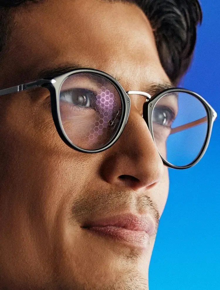 man wearing essilor lenses