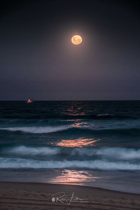 Full moon over ocean