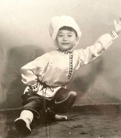 George as a child in traditional Polish dance costume