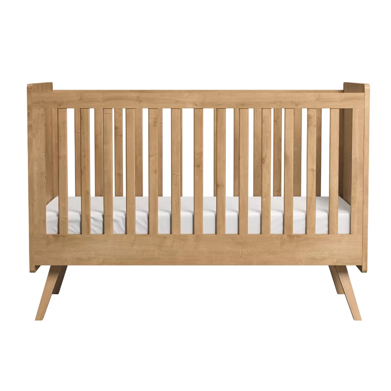 Wooden crib converts to childs bed