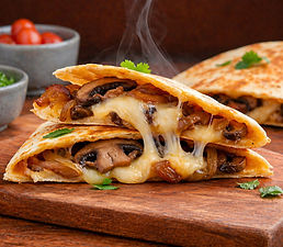 1. Sauté the onion.
2. Add the mushrooms and let them release their juices.
3. Stir in garlic, oregano, pepper, and TERANA chili powder.
4. Cook until lightly browned.
5. Fill tortillas with cheese and the mushroom mixture.
6. Brown on a griddle.
7. Finish with a sprinkle of TERANA Smoked Salt before serving.
