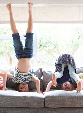 children playing on a couch