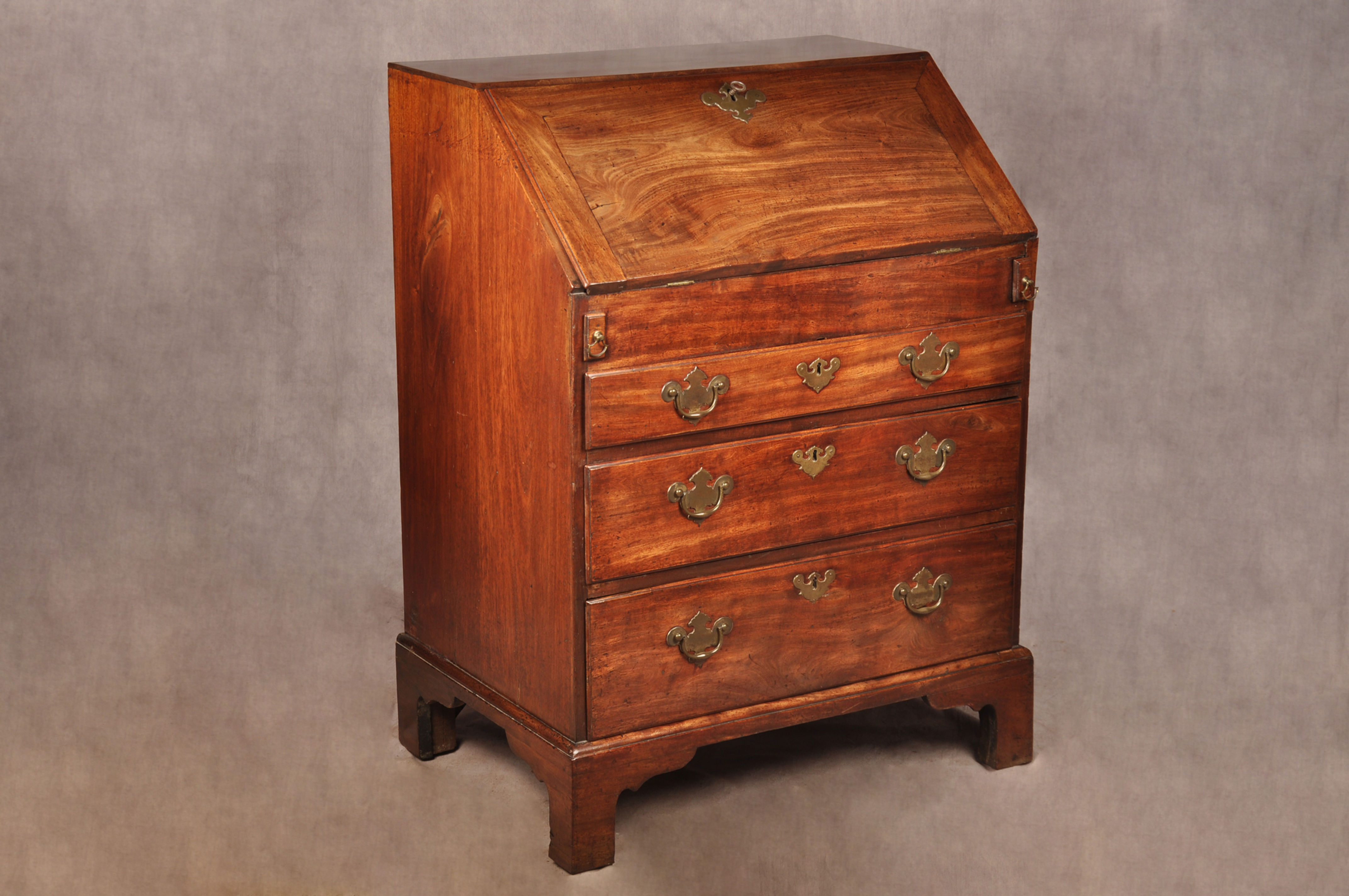 A Fine Small Early 18th Century Mahogany Bureau