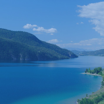 View from a mountain of Kalamalka Lake while the sun shines
