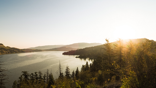 Kalamalka Lake at sunrise with the sun rising from the east