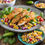 Thumbnail: Passion Infused Eatery's Peachy Salsa Chicken Tenders presented on a bed of corn salad with additional cabbage and halved cherry tomatoes for added freshness and texture. The breaded chicken tenders are the centerpiece of the dish, offering a crispy exterior and tender interior. A delightful combination of flavors and textures, perfect for a satisfying meal. 