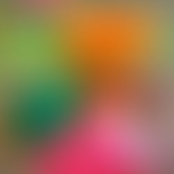 Green and pink PlayDoh in front of a PlayDoh container