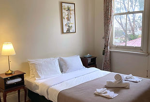 Heritage family room with queen and single bed at The Old Vic Hotel