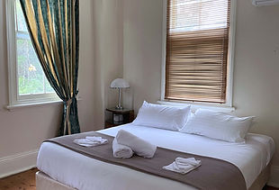 Heritage family room with queen and single bed at The Old Vic Hotel